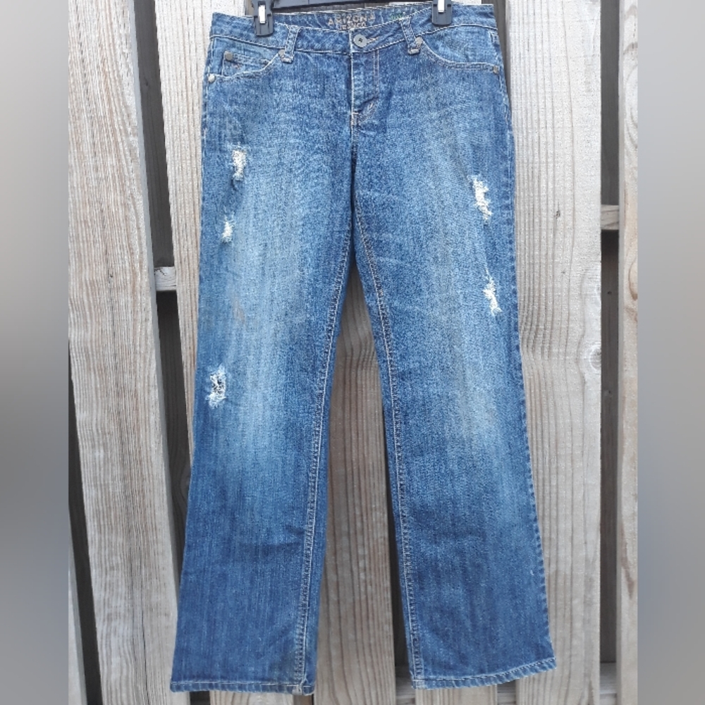 Arizona Jean Co. Bootcut jean. Distressed blue washed. Size 11.